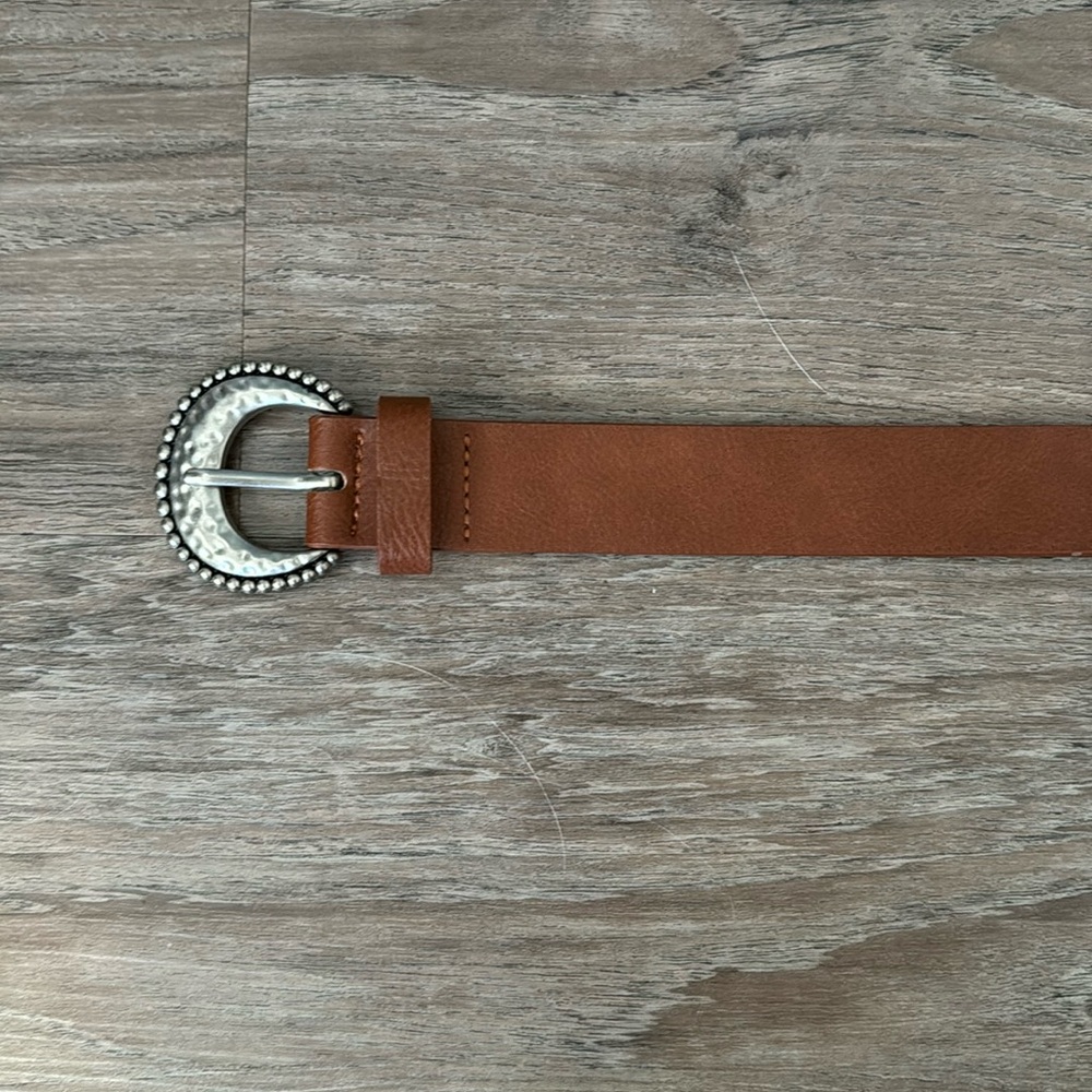 Brown belt with silver buckle